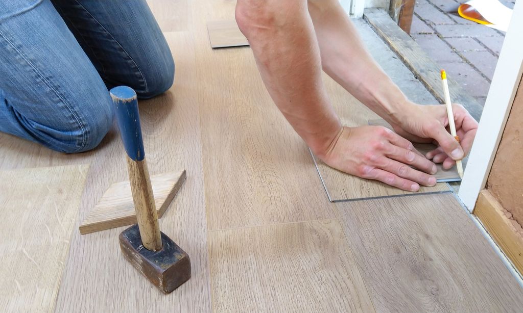 Man Installing Flooring